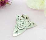 Sterling silver pendant design with irregular triangle and celtic knot at the center