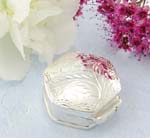 Pyramid shape Sterling silver pill box with flower decor on the cover