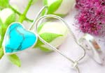 Sterling silver earring with heart shape turquoise and clip-in fish hoop design